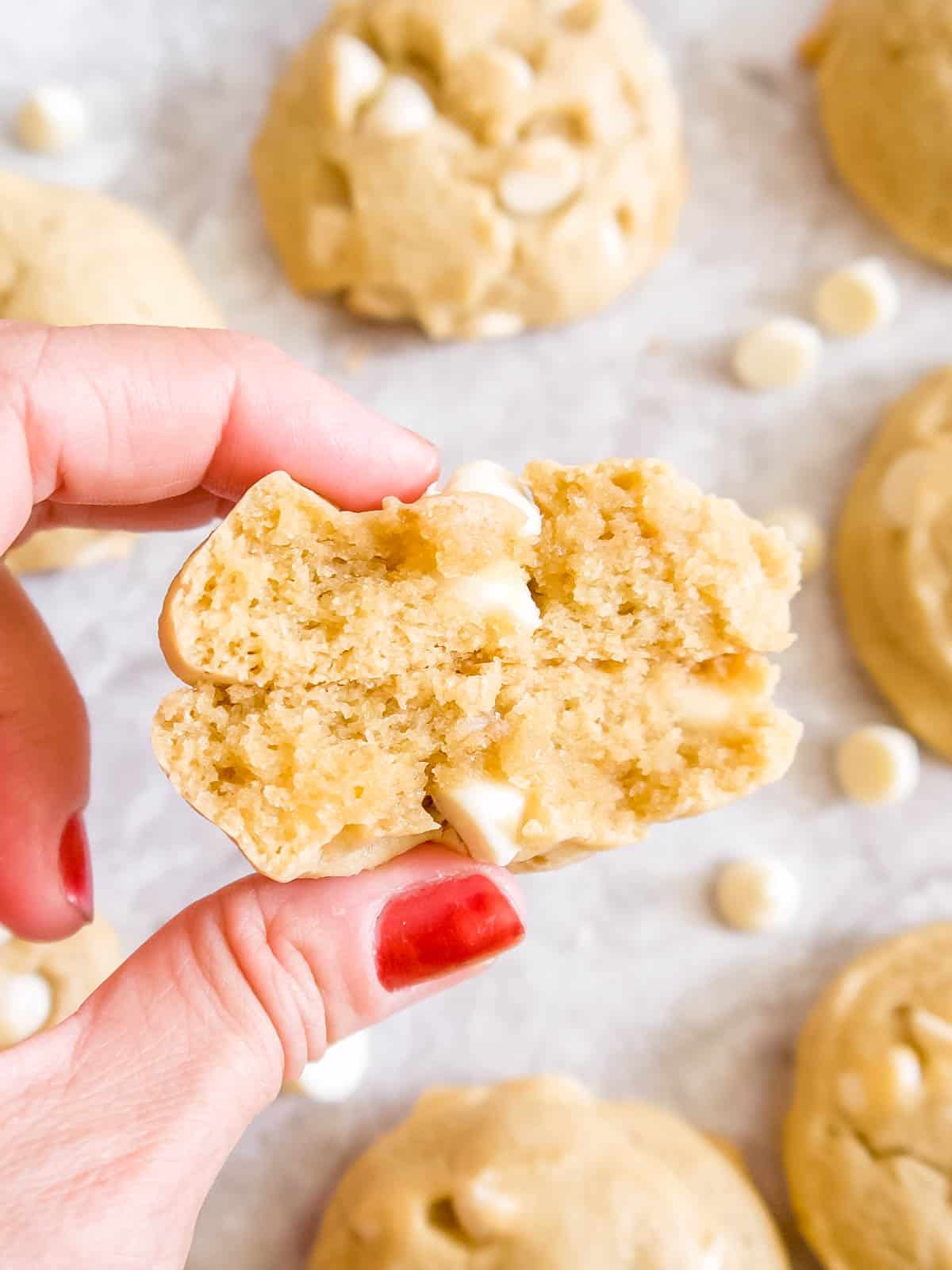 White chocolate chip cookies cut in half.
