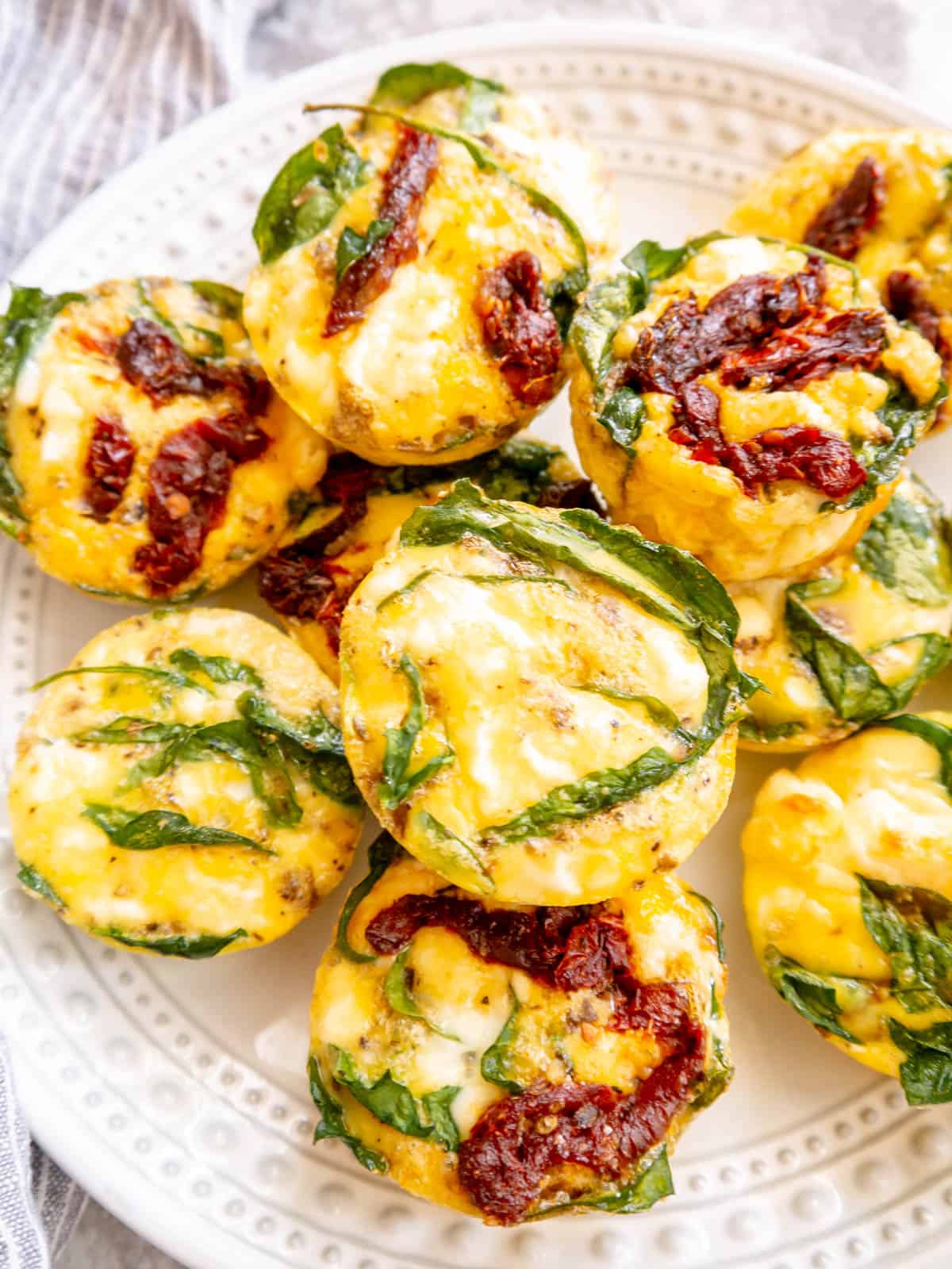 Spinach egg bites on a plate.