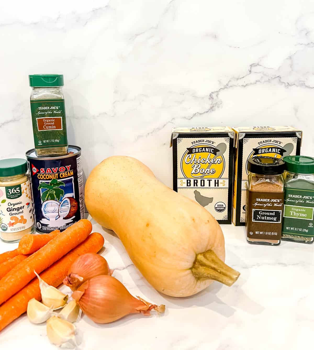 Ingredients needed to make carrot butternut squash soup.