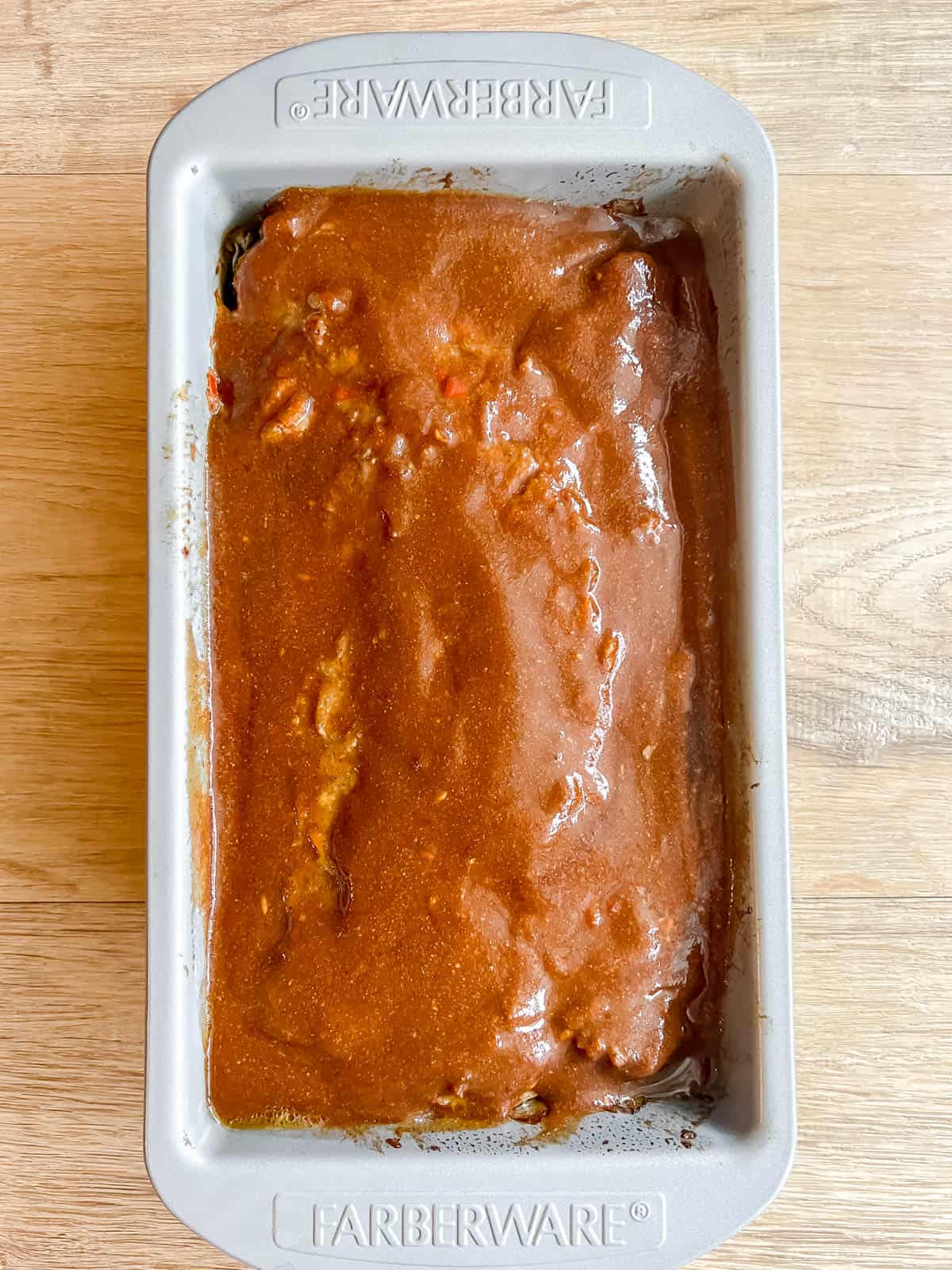 Paleo meatloaf with meatloaf sauce on top.