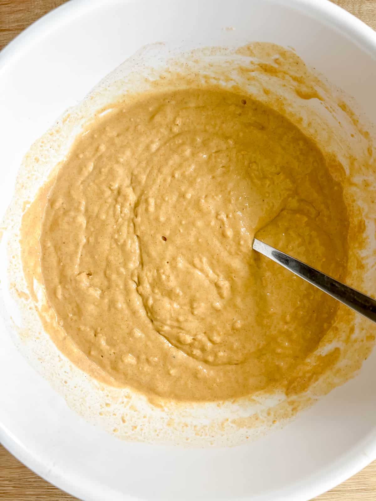 Milk added to the pumpkin pancakes batter.