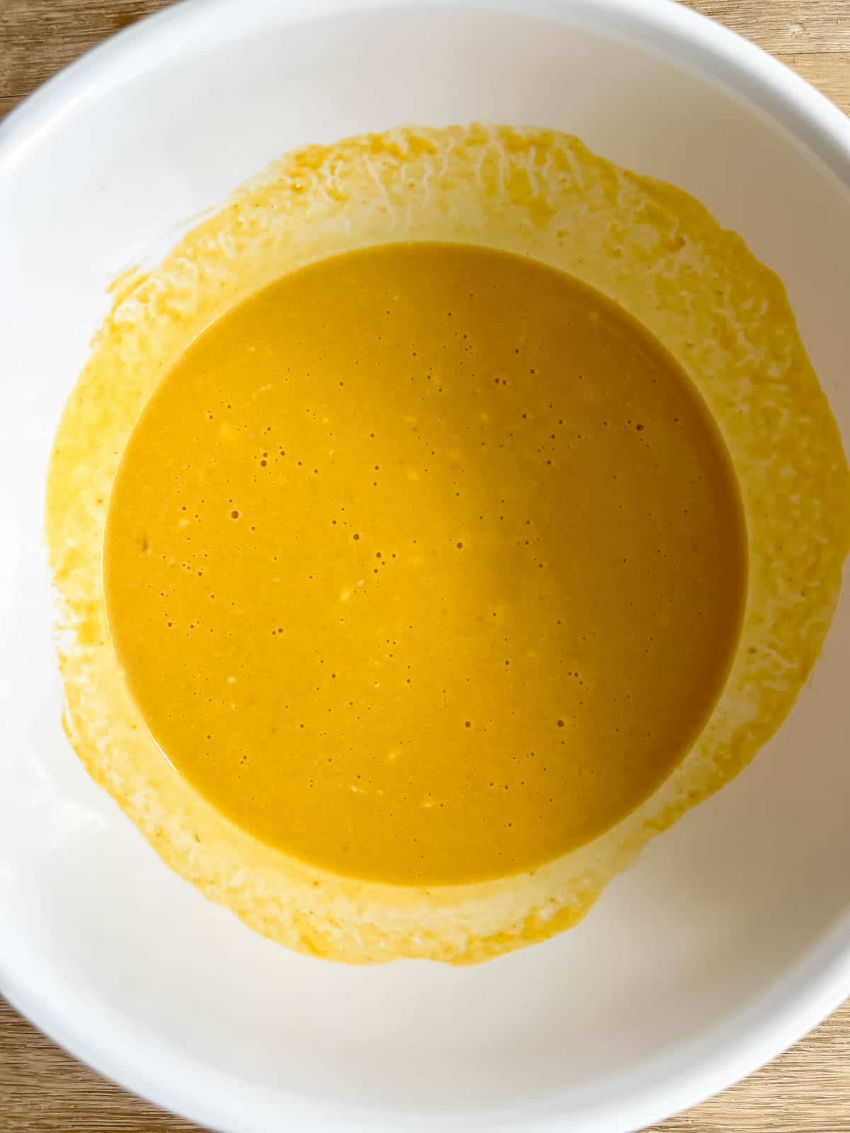 Wet ingredients for pumpkin pancakes.