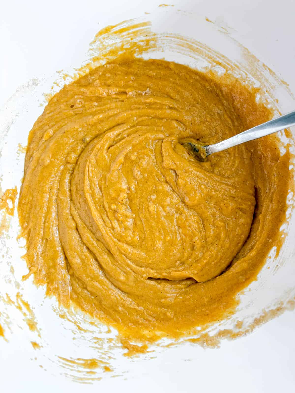 Dairy-free pumpkin batter mixed together.
