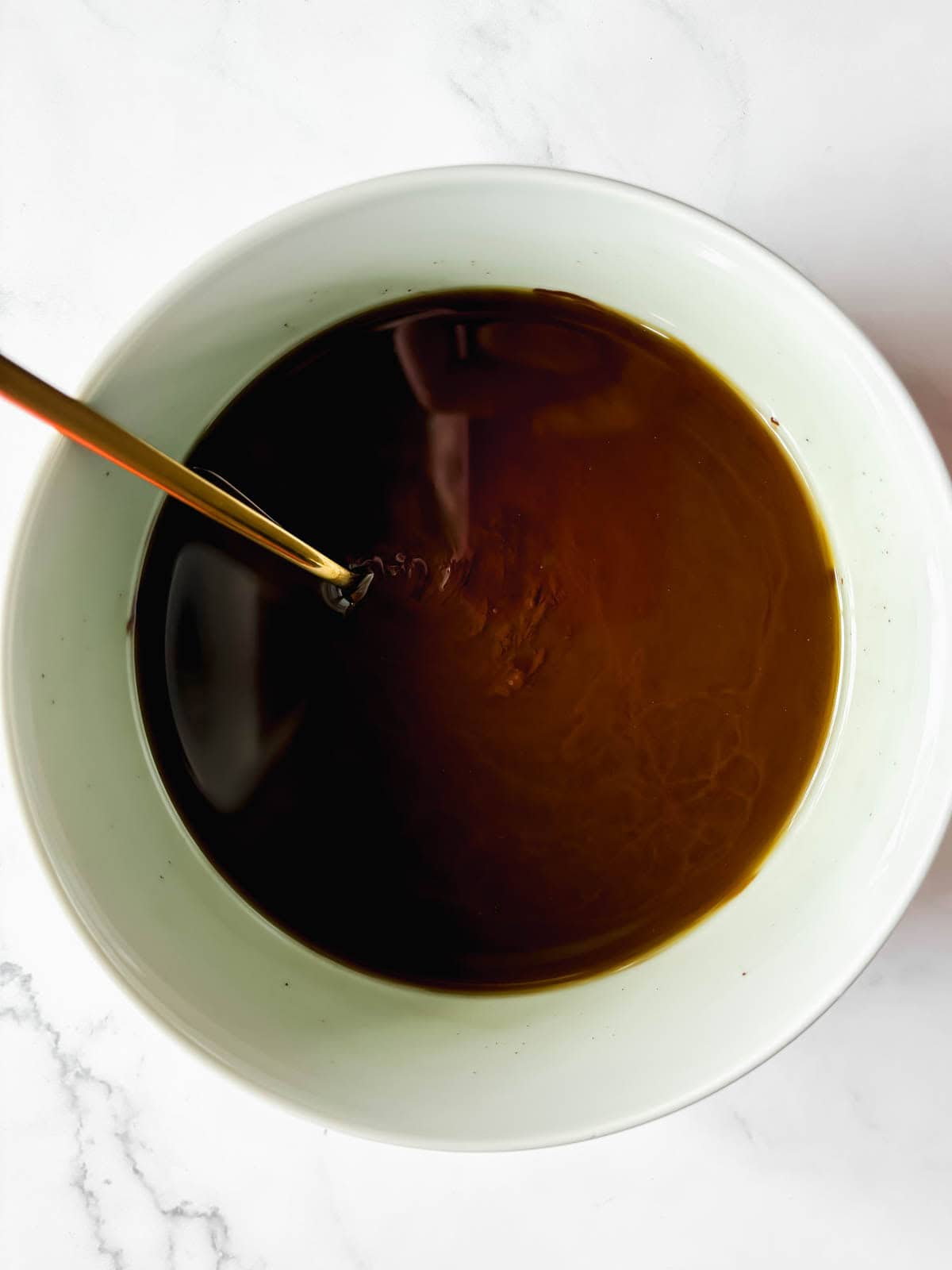 Sugar and vanilla in melted chocolate.