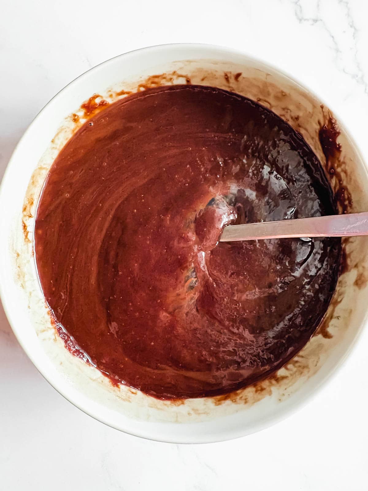 Eggs added to brownie batter.