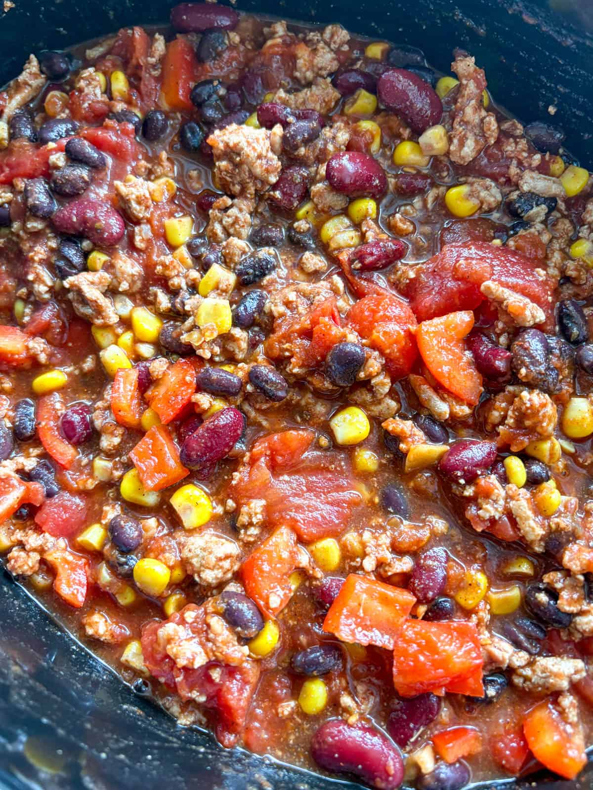 Slow cooker turkey chili before cooking.