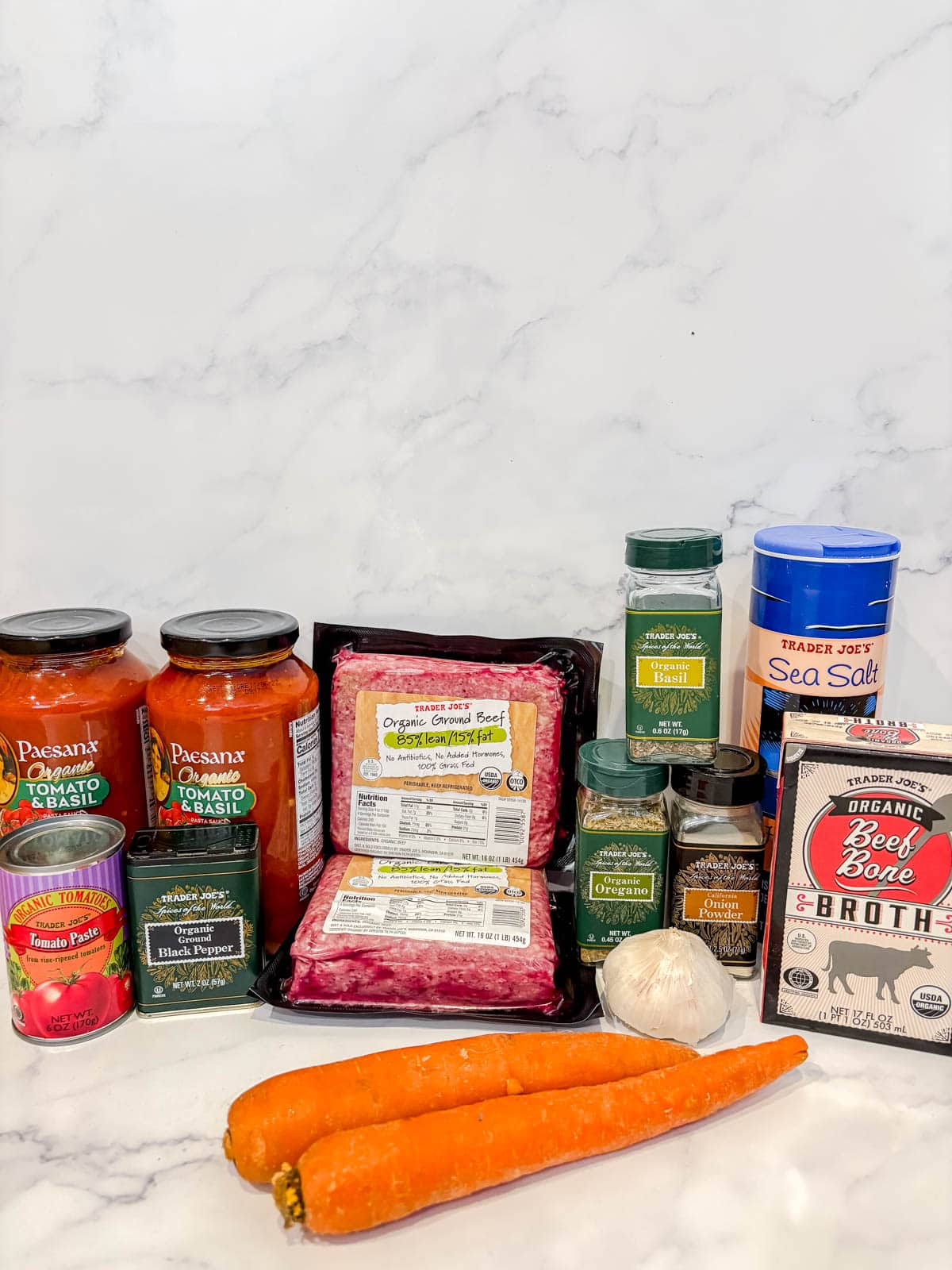 Ingredients for slow cooker spaghetti sauce with ground beef.