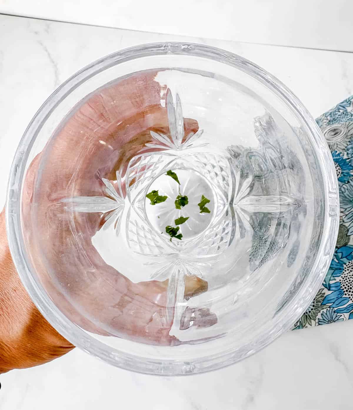 Mint muddled in an alcohol shaker.