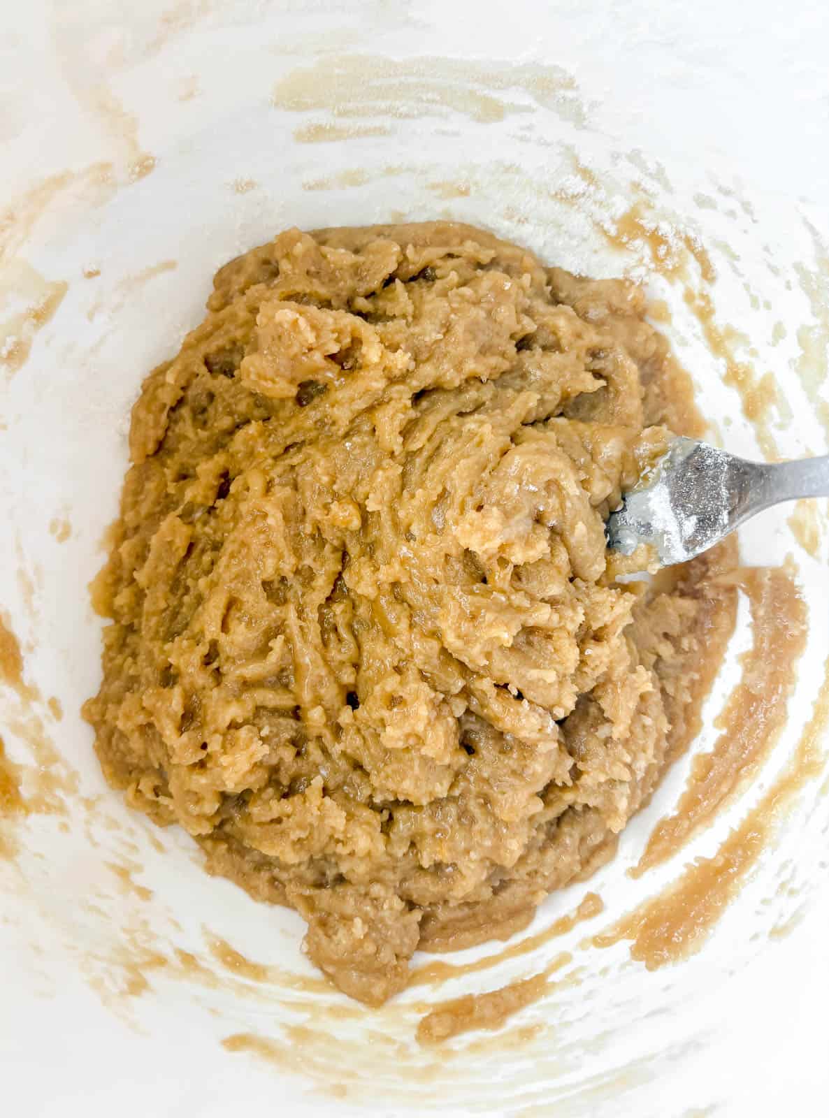 Cookie dough for small batch chocolate chip cookies in a bowl.
