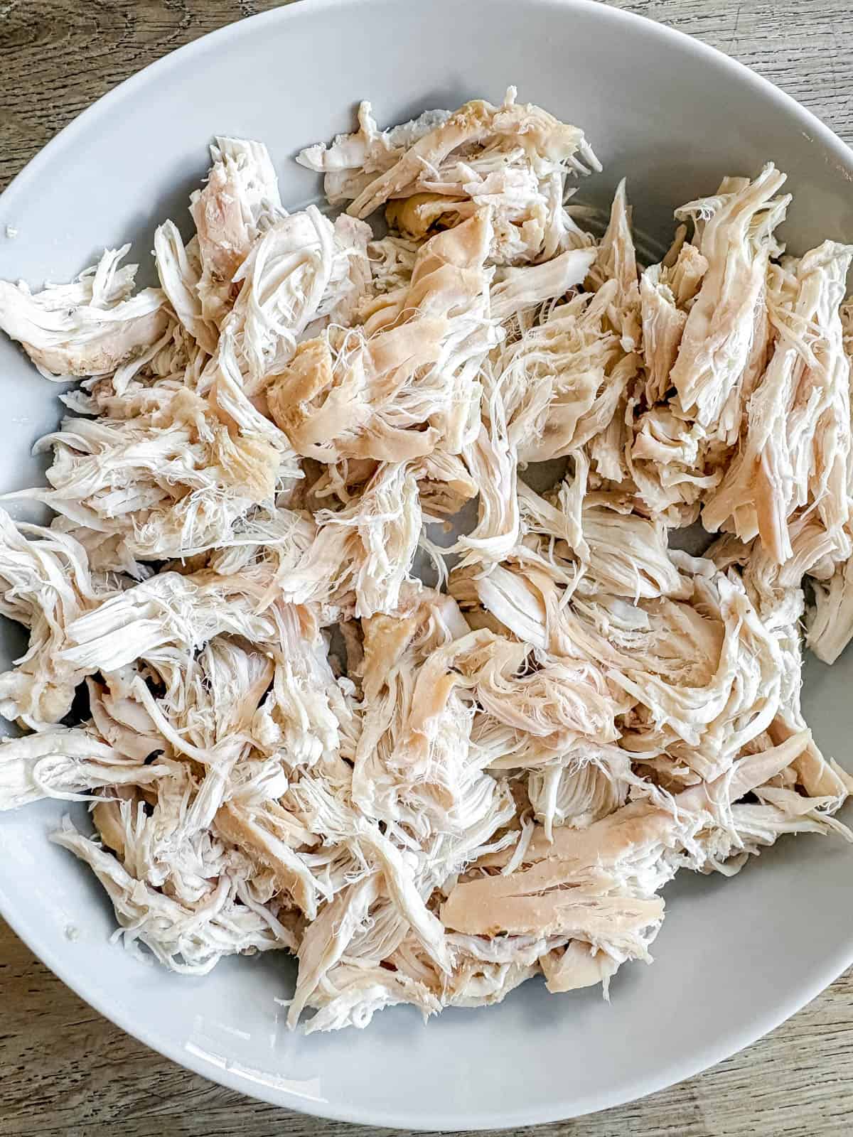Shredded chicken breast on a plate.