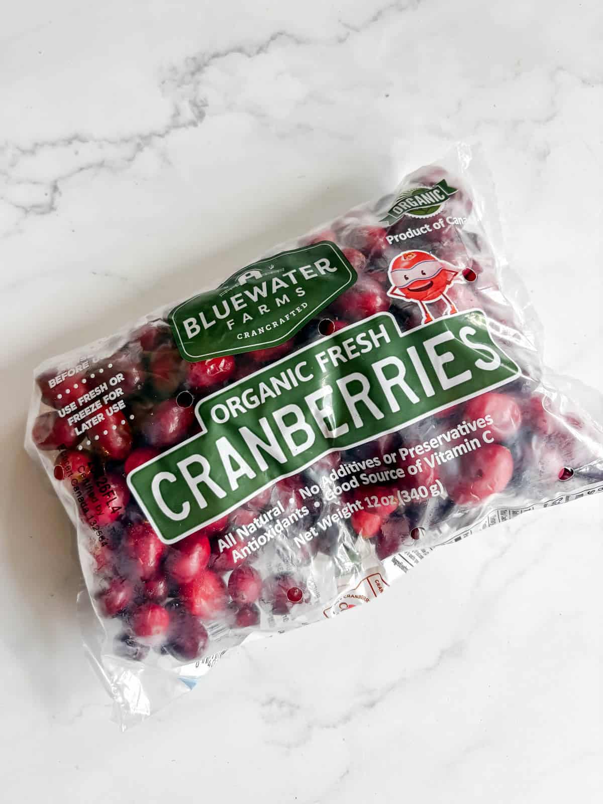 Fresh cranberries in a bag.