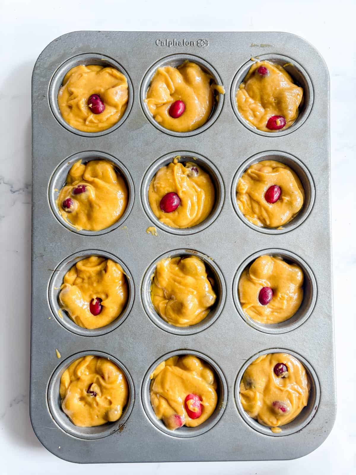 Pumpkin cranberry muffins before baking.